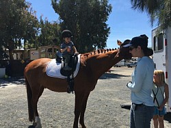 Brady earned a qualifying score at I1 and then gave pony rides!